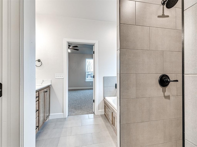 bathroom with independent shower and bath, vanity, and tile patterned flooring