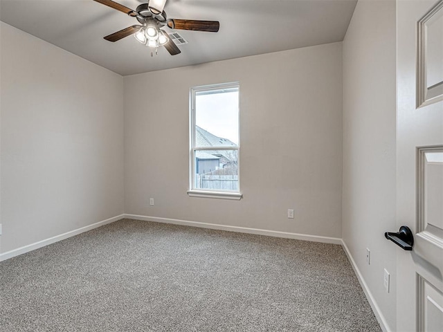 empty room with carpet and ceiling fan