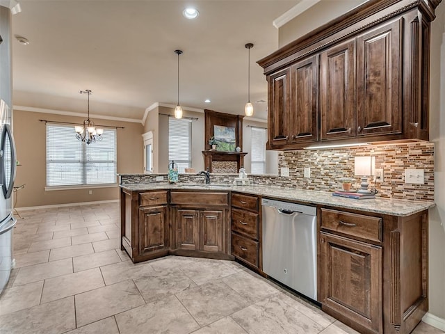 kitchen with decorative light fixtures, sink, decorative backsplash, ornamental molding, and stainless steel dishwasher