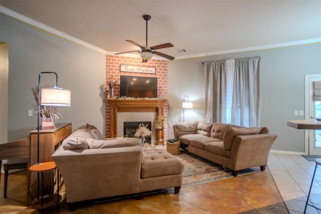 tiled living room featuring ornamental molding, a brick fireplace, and ceiling fan