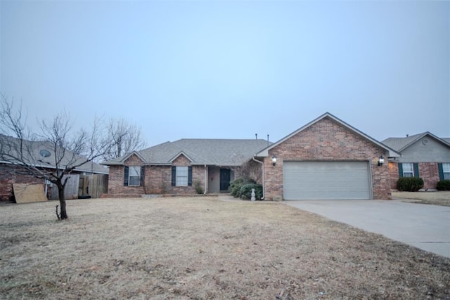 single story home featuring a garage