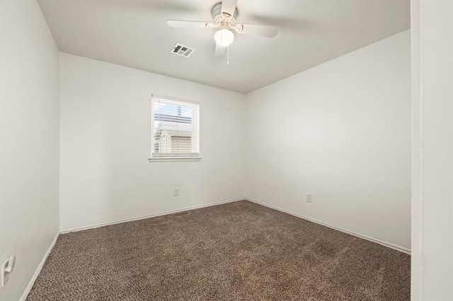 unfurnished room featuring carpet and ceiling fan