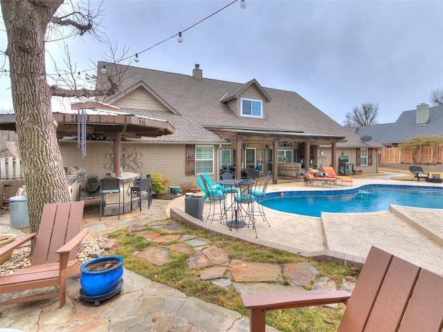 view of pool featuring a patio