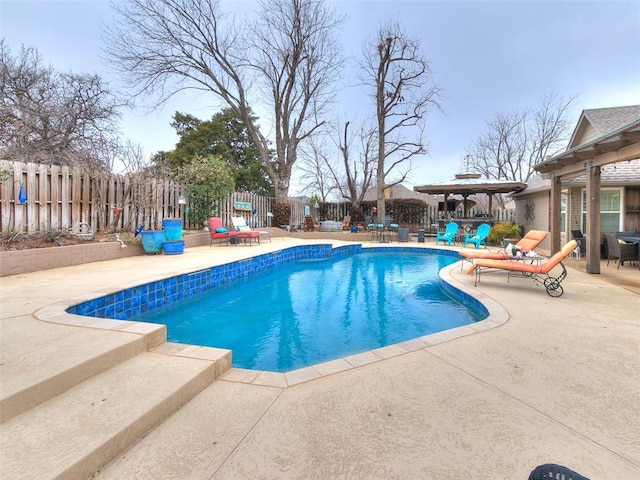 view of pool featuring a gazebo and a patio