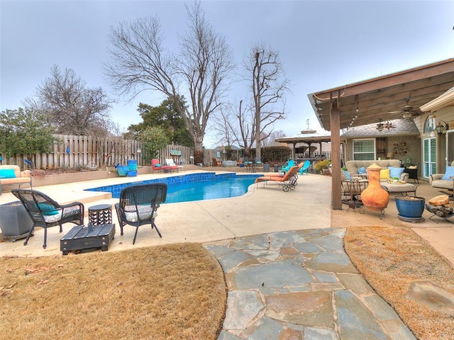 view of pool featuring a patio and ceiling fan