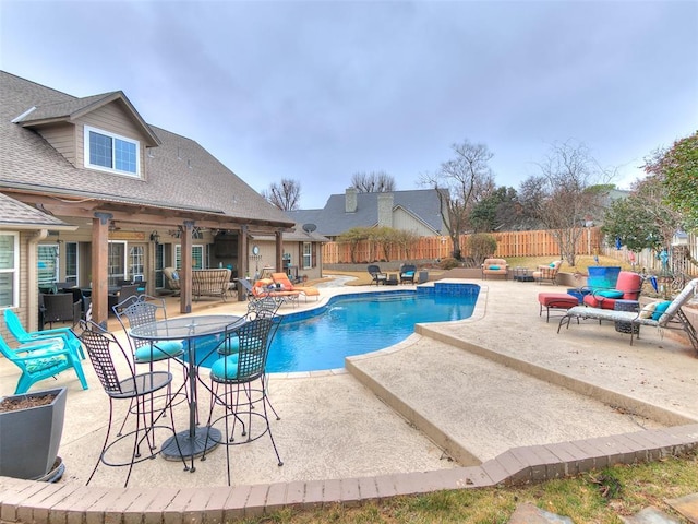 view of swimming pool featuring outdoor lounge area and a patio area