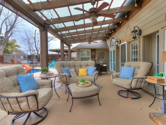 view of patio / terrace with a fenced in pool, ceiling fan, an outdoor living space, and a pergola