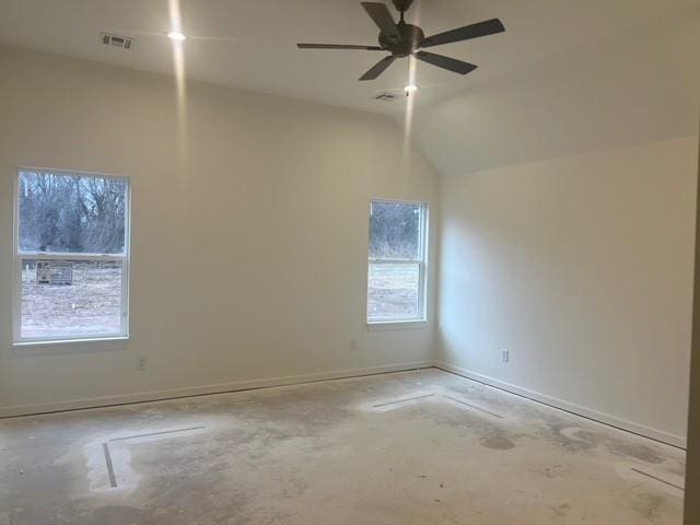 spare room with vaulted ceiling and ceiling fan