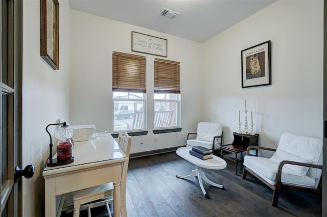 living area with dark hardwood / wood-style flooring