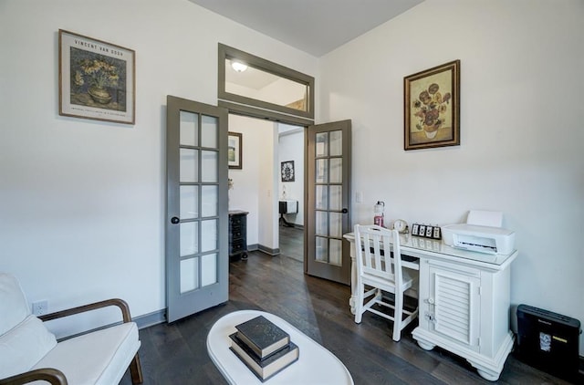 home office featuring dark hardwood / wood-style floors and french doors