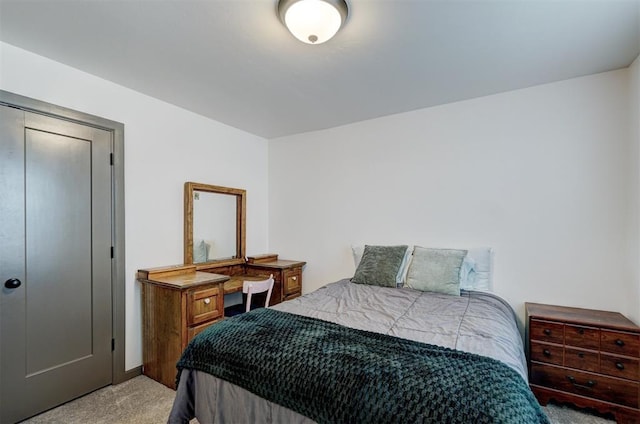 bedroom with light carpet