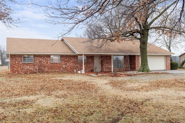 ranch-style home with a garage