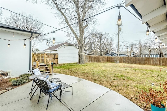 view of patio / terrace with a storage unit