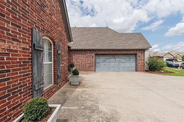 view of property exterior featuring a garage