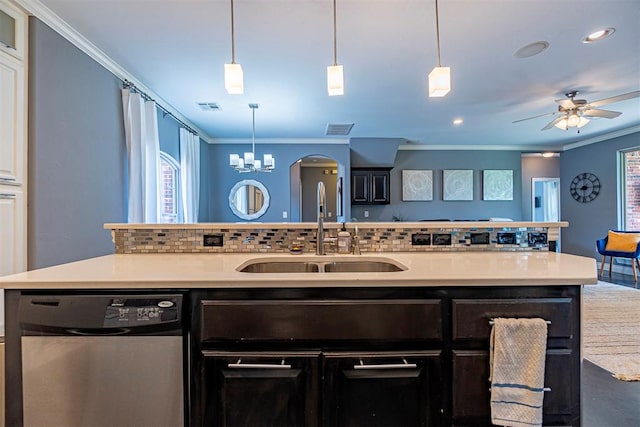 kitchen featuring sink, crown molding, dishwasher, decorative backsplash, and decorative light fixtures