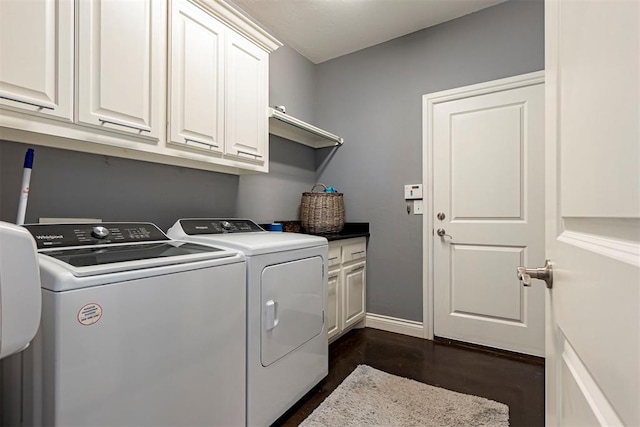 laundry area with cabinets and independent washer and dryer