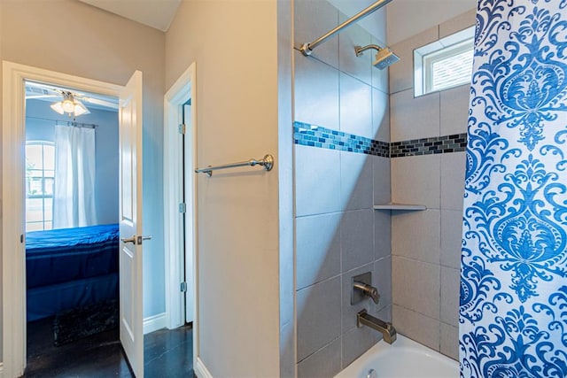 bathroom with shower / tub combo