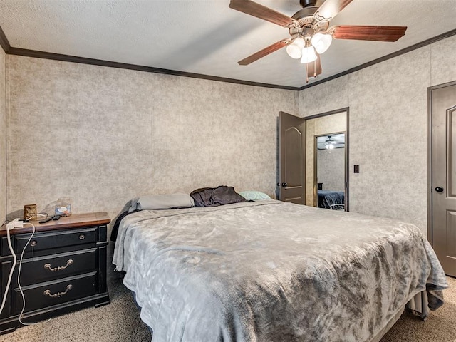 carpeted bedroom with a ceiling fan and crown molding