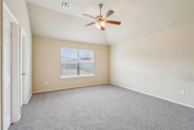 unfurnished bedroom with lofted ceiling, carpet, and ceiling fan