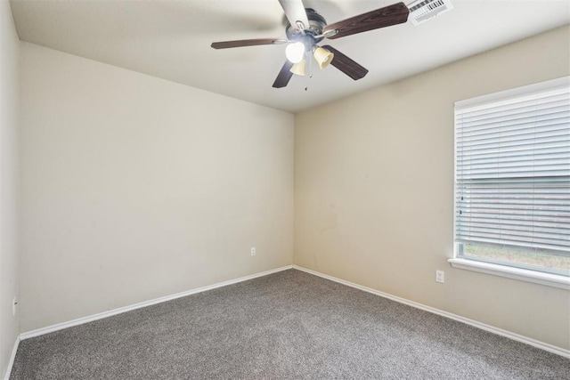 carpeted empty room with ceiling fan