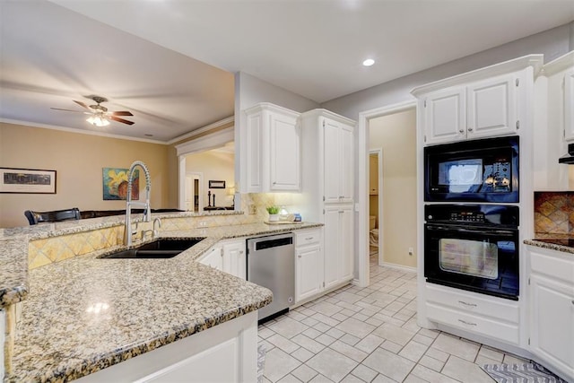 kitchen with white cabinetry, sink, kitchen peninsula, and black appliances