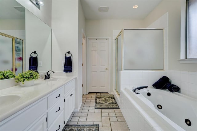 bathroom with vanity, shower with separate bathtub, and tile patterned floors