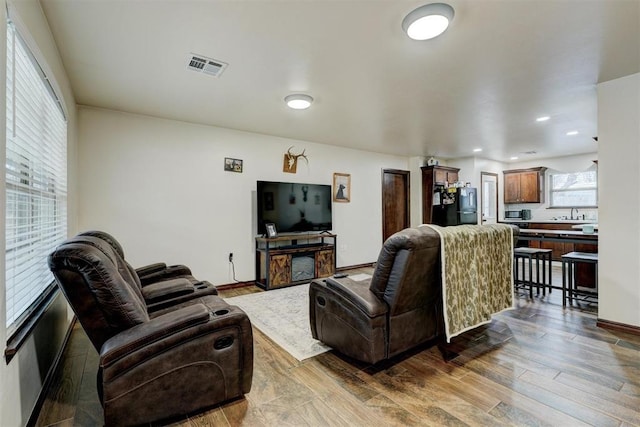 living room with hardwood / wood-style flooring