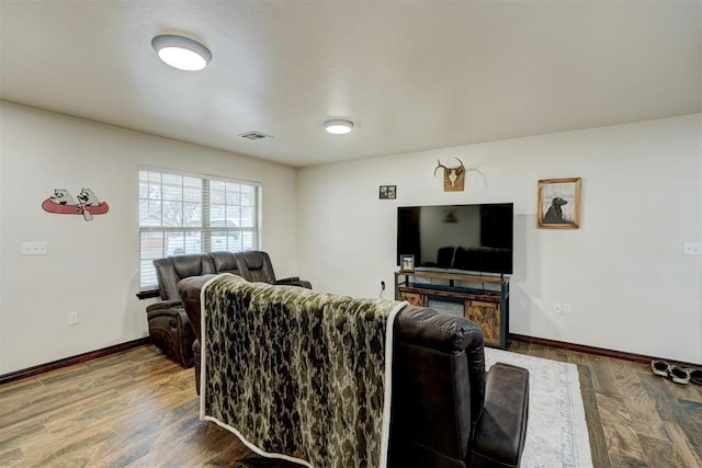 living room with wood-type flooring