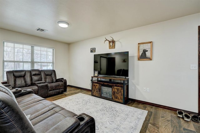 living room with dark hardwood / wood-style floors