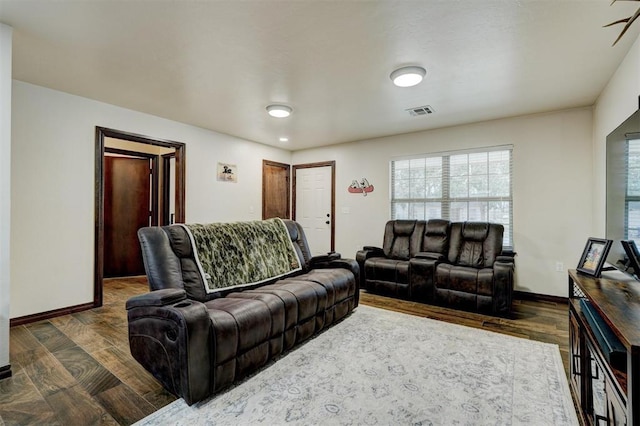 living room featuring dark hardwood / wood-style flooring