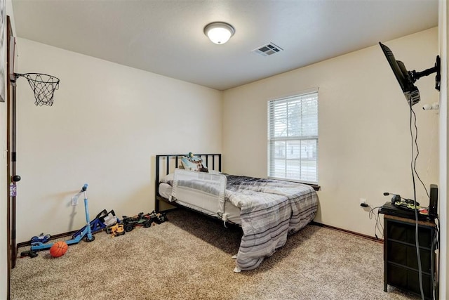 bedroom with light carpet