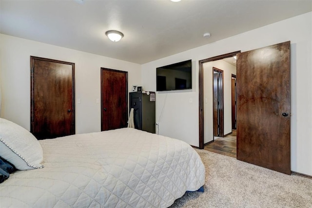 bedroom with light colored carpet