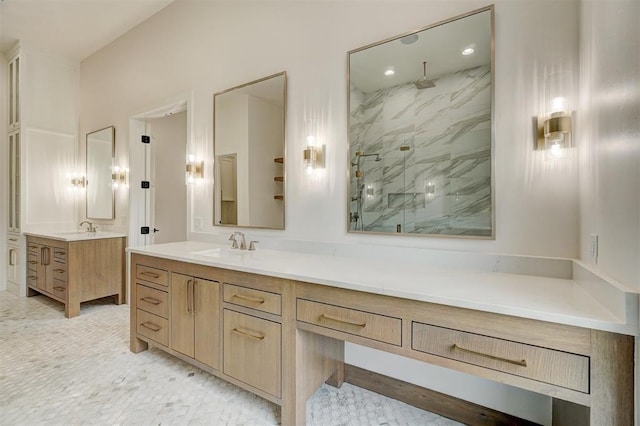 bathroom featuring vanity and a shower