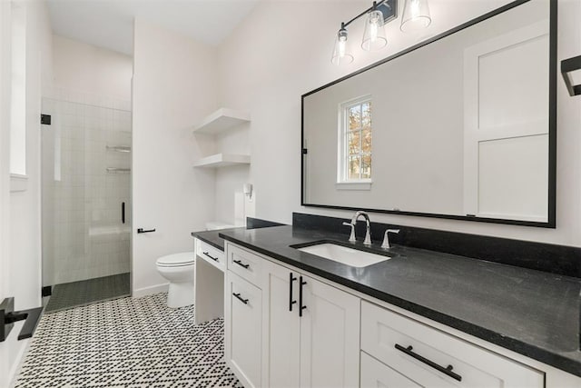 bathroom featuring walk in shower, vanity, and toilet