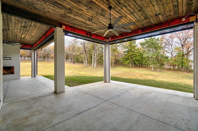 view of patio featuring ceiling fan