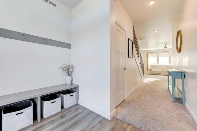 hallway with light wood-type flooring