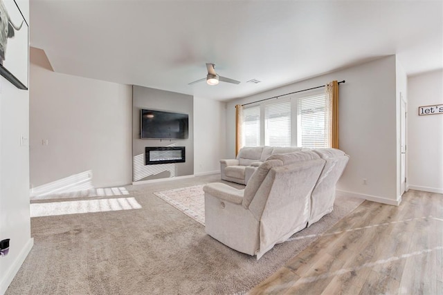 living room featuring ceiling fan