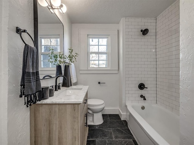 full bathroom with shower / bathtub combination, toilet, a textured ceiling, vanity, and baseboards