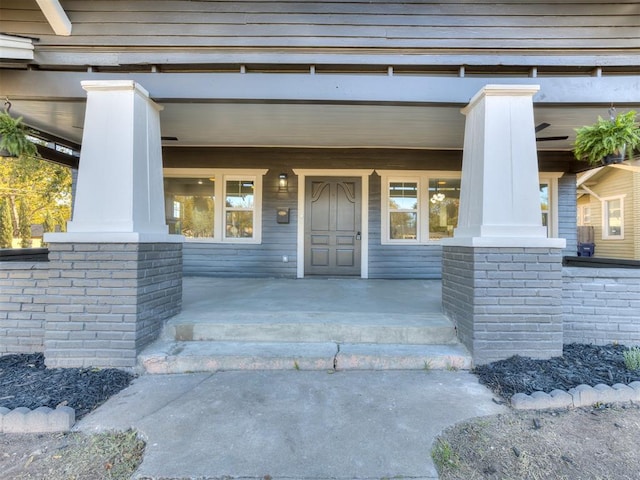 entrance to property with covered porch