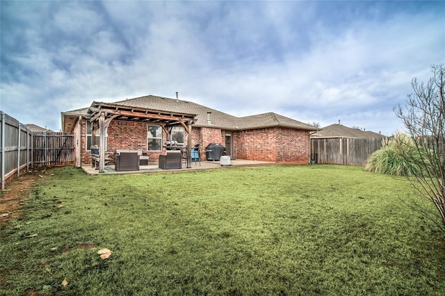 back of property with a patio, outdoor lounge area, a yard, and cooling unit