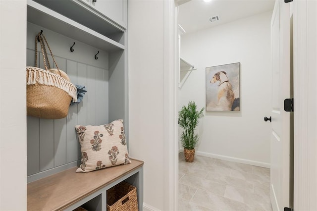 616 Montauk Way, Edmond, OK 73034 - mudroom featuring visible vents and baseboards