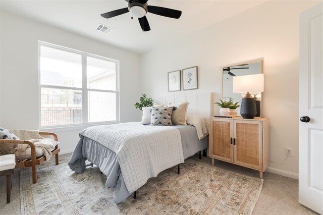 616 Montauk Way, Edmond, OK 73034 - carpeted bedroom featuring visible vents, ceiling fan, and baseboards