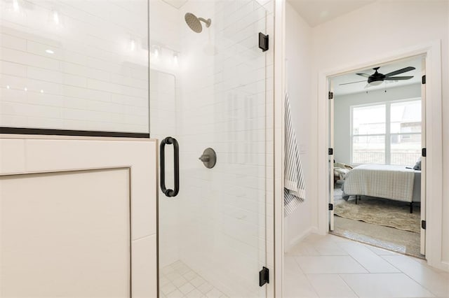 616 Montauk Way, Edmond, OK 73034 - full bath featuring a ceiling fan, a shower stall, and connected bathroom