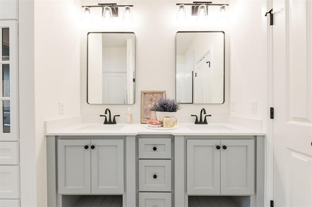 616 Montauk Way, Edmond, OK 73034 - bathroom featuring double vanity and a sink
