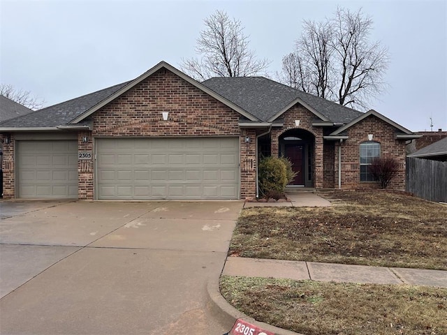 ranch-style home featuring a garage