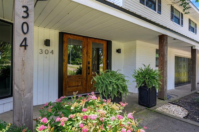 doorway to property featuring french doors