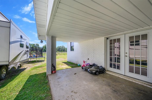 view of patio / terrace featuring french doors and a trampoline