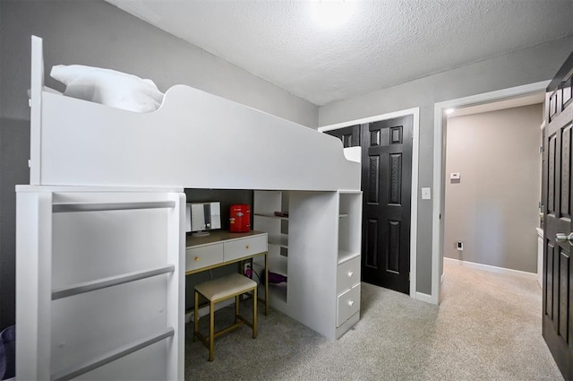 bedroom featuring a textured ceiling