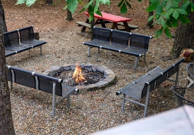 view of home's community with a fire pit