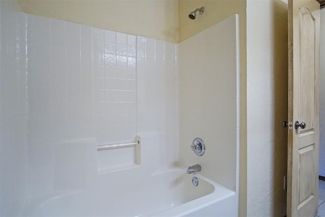 bathroom with shower / bathtub combination